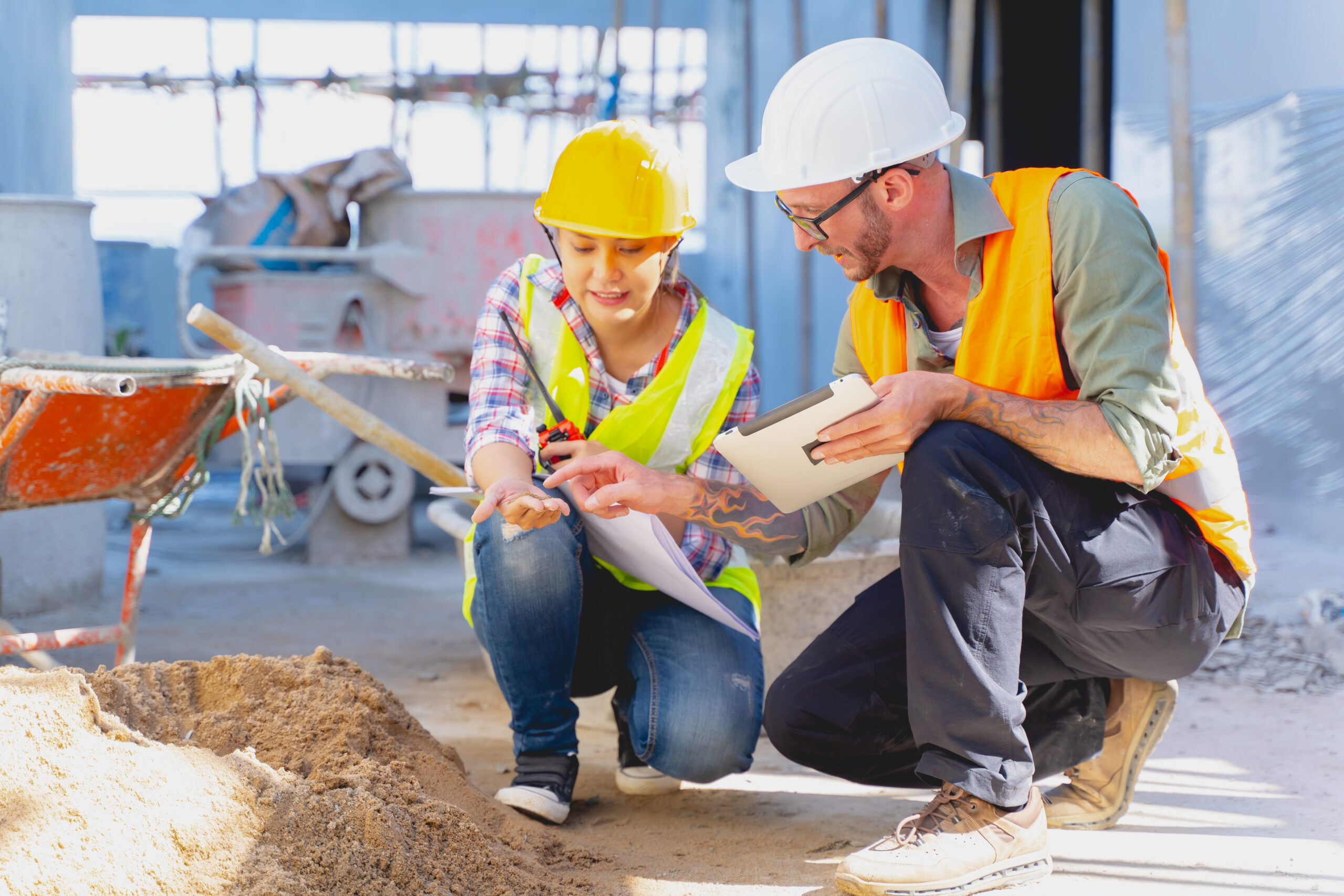 construction engineer team check quality of build sand material for strength quality of new building